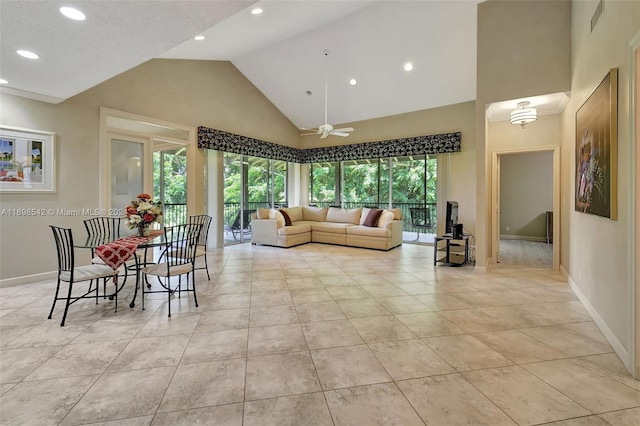 living room featuring ceiling fan, light tile patterned floors, a textured ceiling, and high vaulted ceiling