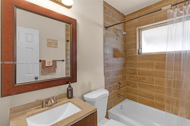 full bathroom featuring vanity, shower / tub combo, and toilet