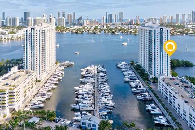 birds eye view of property featuring a water view