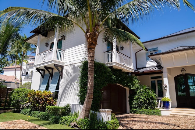 exterior space featuring a balcony