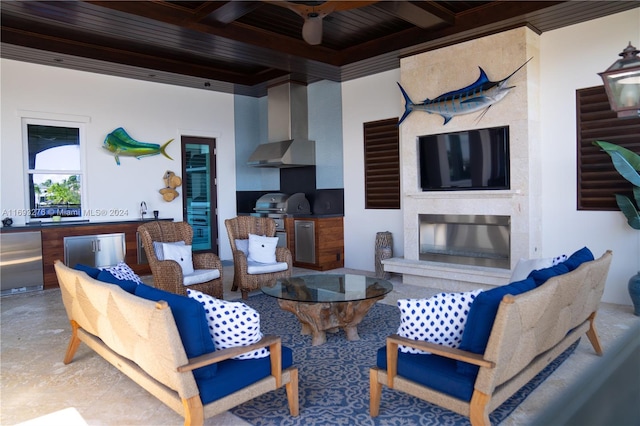 living room featuring ceiling fan, beam ceiling, ornamental molding, and coffered ceiling