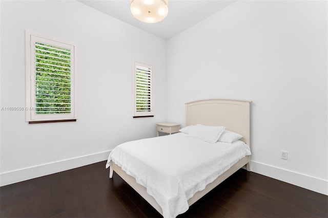 bedroom featuring dark hardwood / wood-style floors