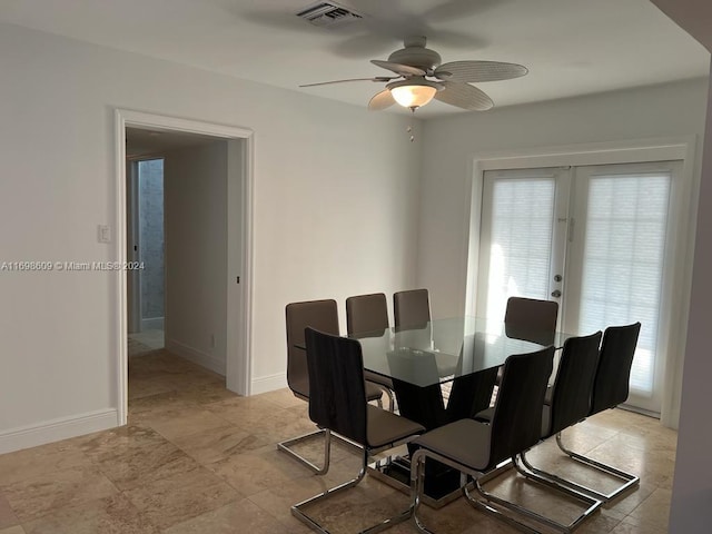 dining space with ceiling fan