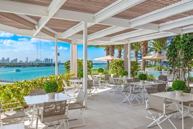 view of patio / terrace with a water view