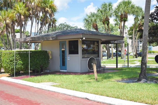 exterior space with a front yard