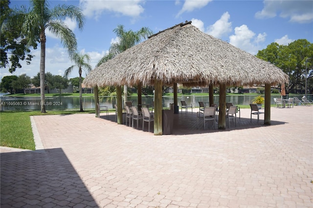 view of community featuring a gazebo and a water view