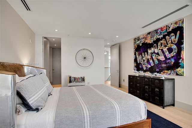 bedroom with light wood-type flooring