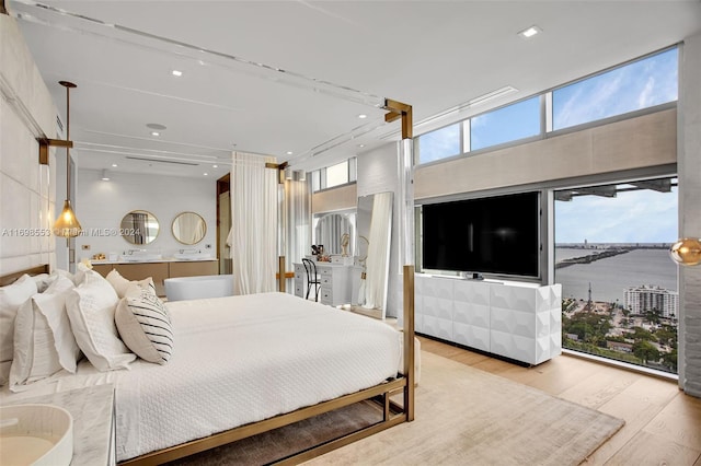 bedroom featuring light wood-type flooring