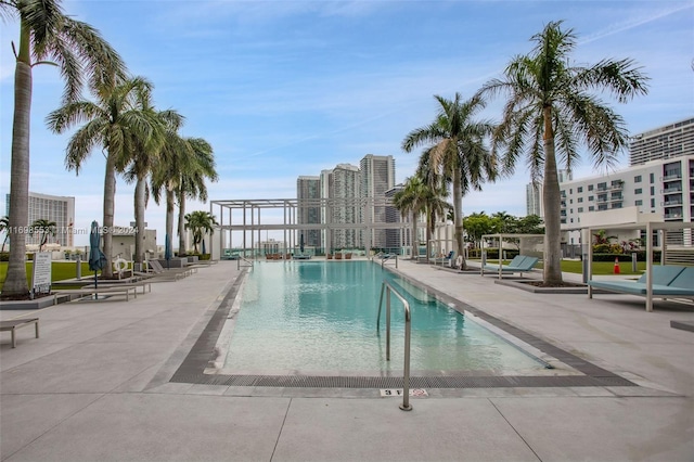 view of swimming pool with a patio area