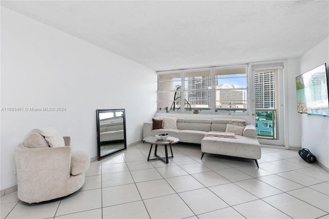 living room featuring light tile patterned floors