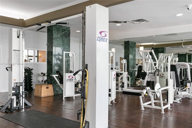 gym with dark wood-type flooring