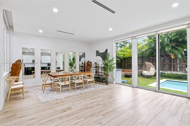1816 SW 23rd St, Miami, FL 33145 - dining room featuring healthy amount of natural light, light wood-type flooring, and recessed lighting