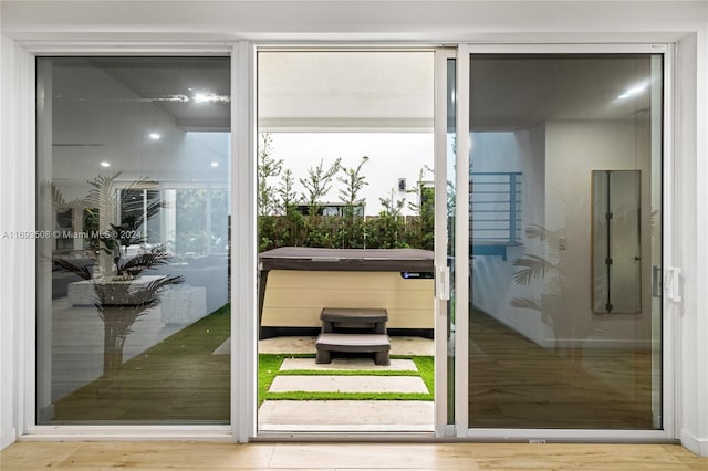 1816 SW 23rd St, Miami, FL 33145 - doorway to outside featuring wood finished floors