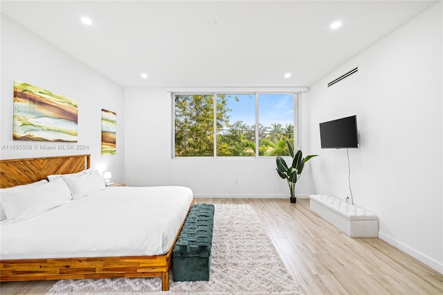 bedroom featuring light wood-type flooring