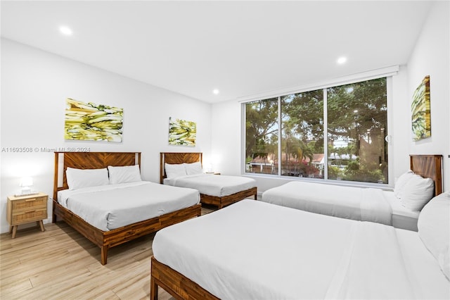 bedroom with light hardwood / wood-style flooring