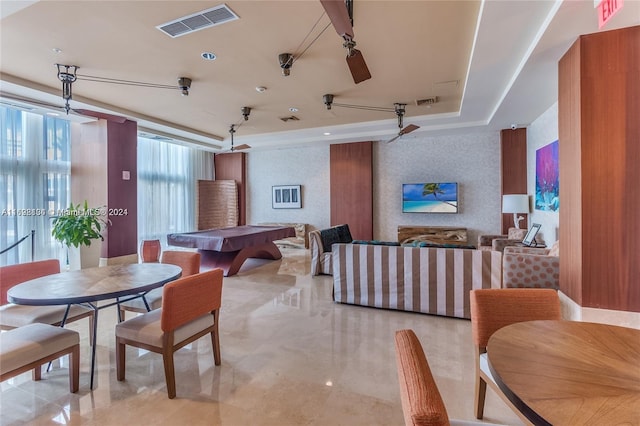 recreation room featuring billiards and a tray ceiling