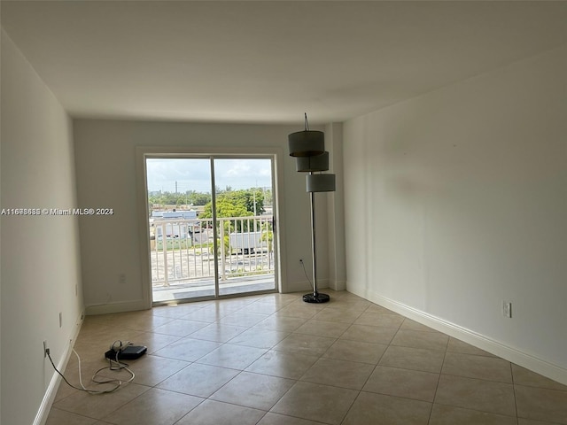 empty room featuring light tile patterned floors