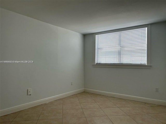 view of tiled spare room