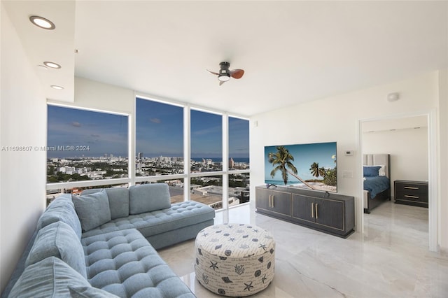 living room featuring a wall of windows