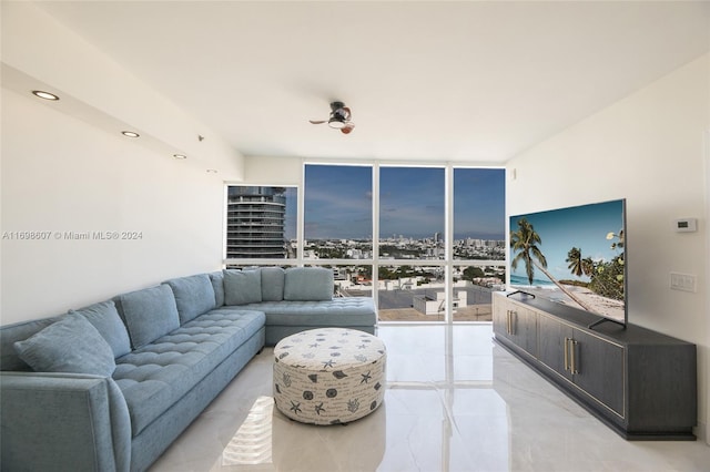 living room with floor to ceiling windows