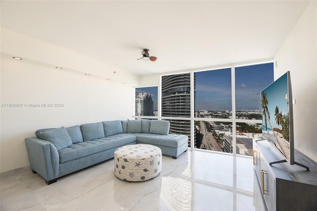 living room with floor to ceiling windows