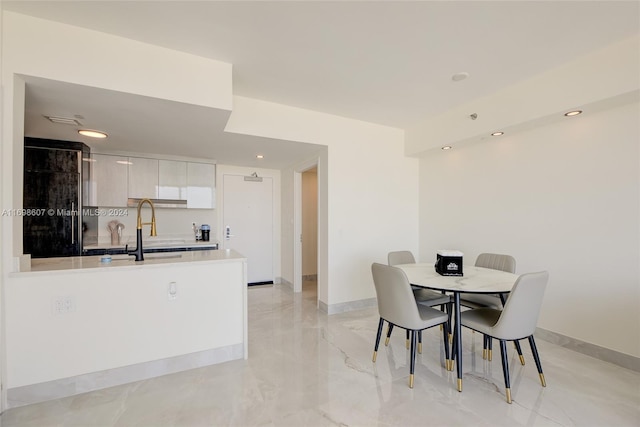 dining room with sink