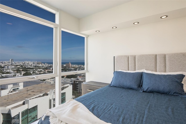 bedroom featuring floor to ceiling windows