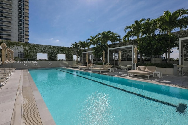 view of swimming pool with a patio area