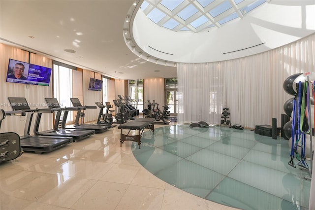 workout area featuring tile patterned flooring