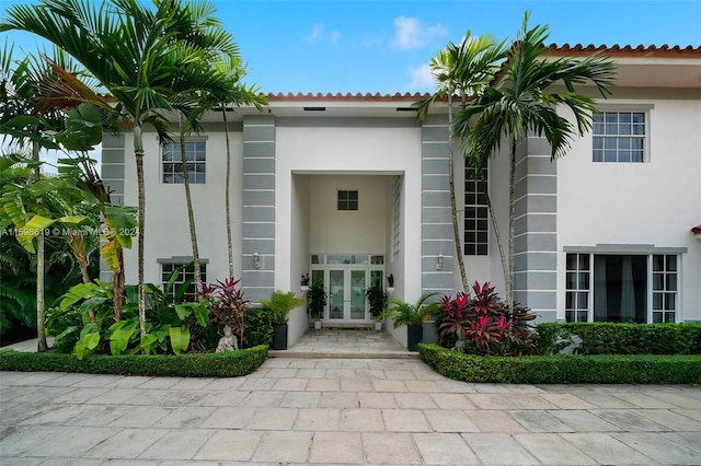 doorway to property featuring french doors