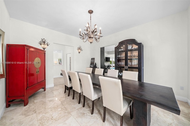 dining room featuring an inviting chandelier