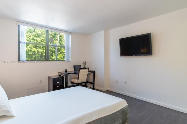 bedroom featuring dark hardwood / wood-style floors