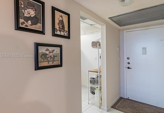 interior space with light tile patterned flooring