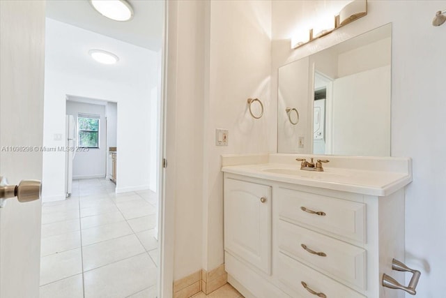 bathroom featuring tile patterned floors and vanity