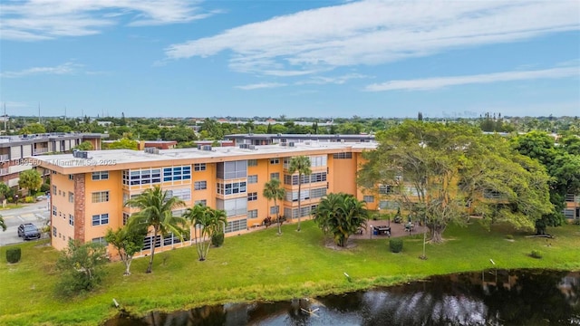 drone / aerial view with a water view