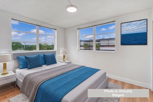 bedroom featuring hardwood / wood-style flooring