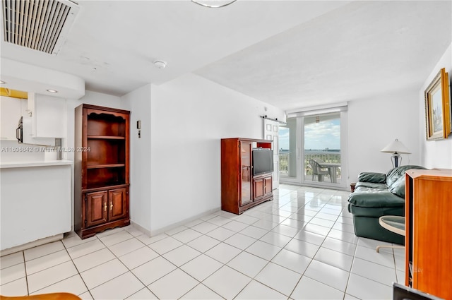 living room featuring light tile patterned flooring