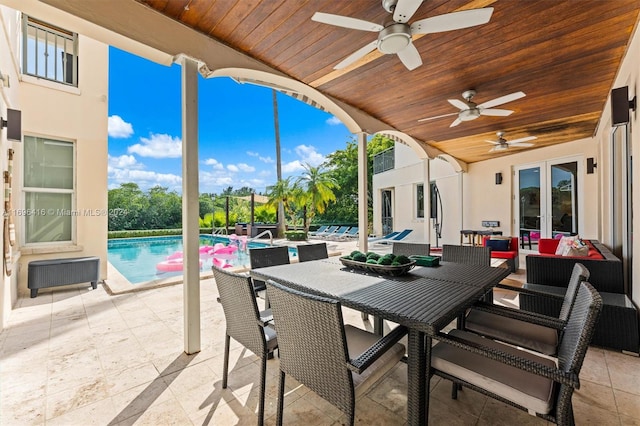 view of patio / terrace with french doors, an outdoor hangout area, and ceiling fan