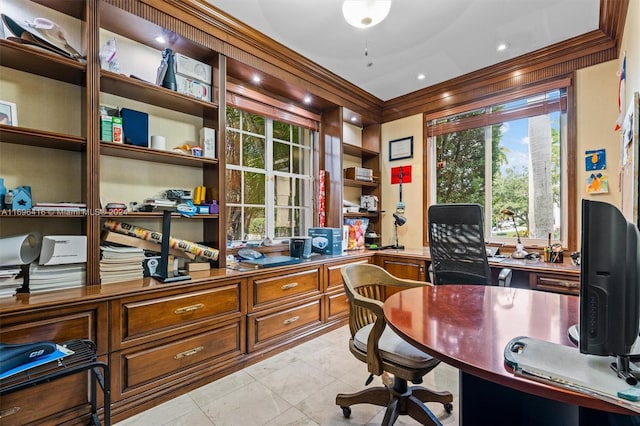 office with light tile patterned floors, a healthy amount of sunlight, and ornamental molding