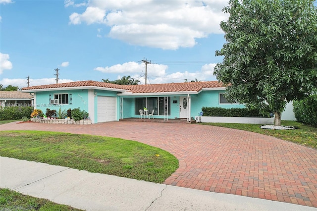 ranch-style house with a garage