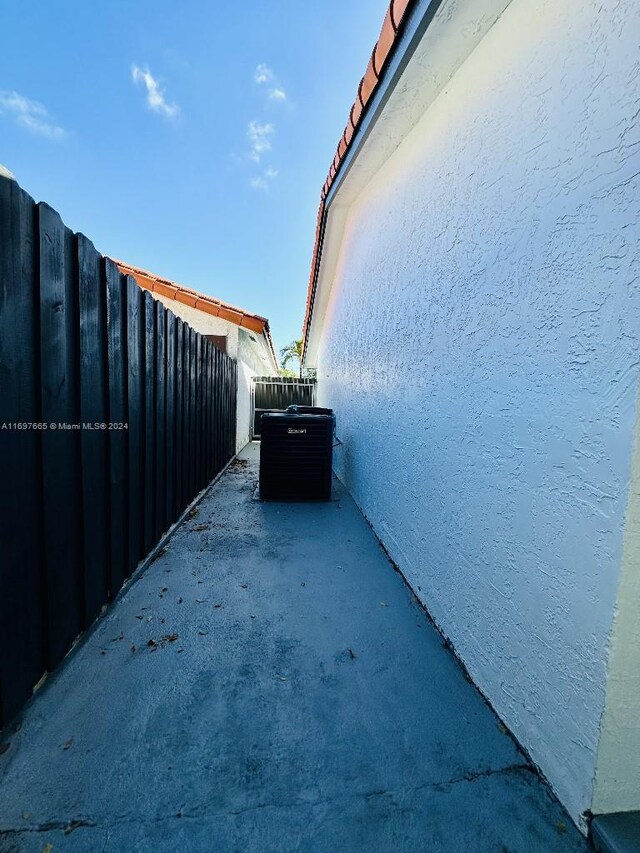 view of home's exterior featuring cooling unit