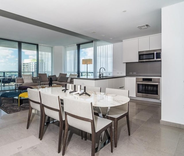 dining area featuring sink