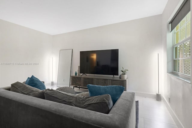 living room featuring light tile patterned floors