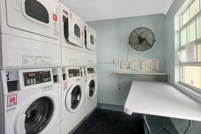 laundry area featuring stacked washer / dryer and separate washer and dryer