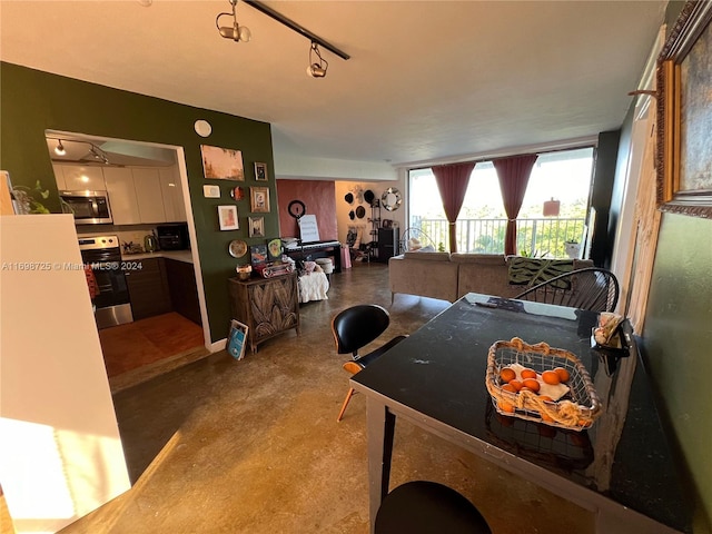 game room with concrete flooring