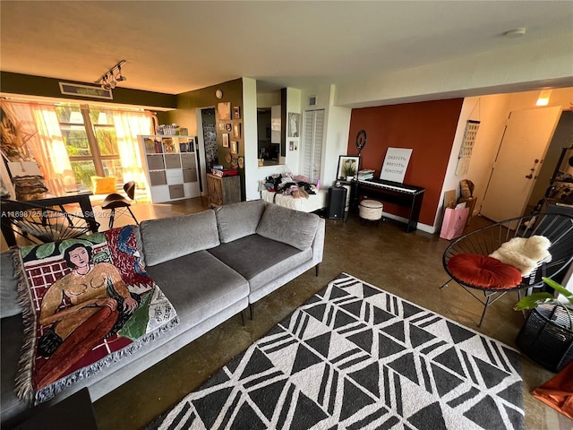 living room with concrete flooring