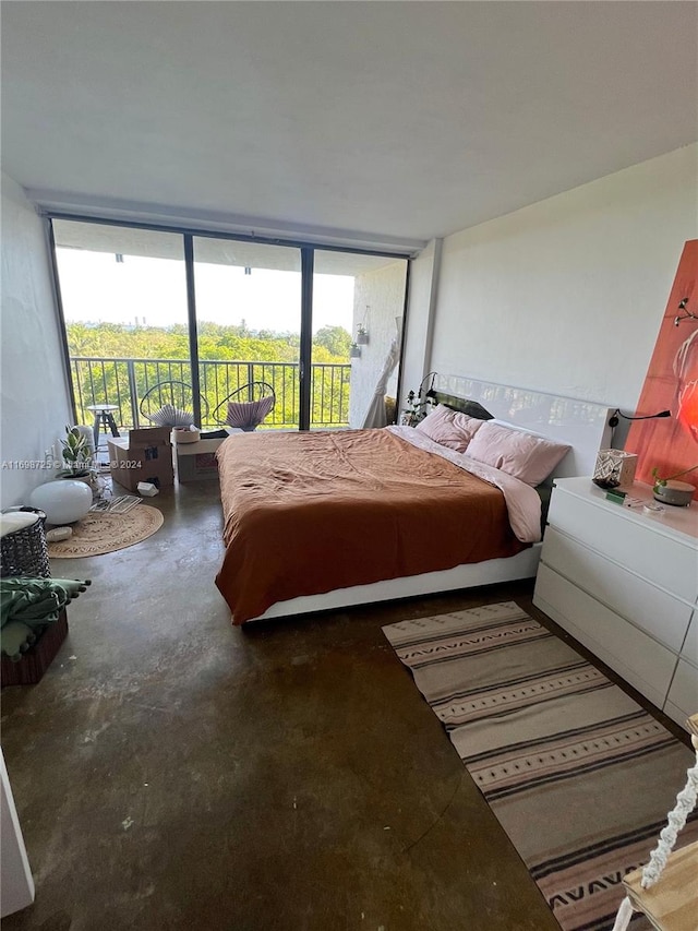 bedroom featuring concrete floors