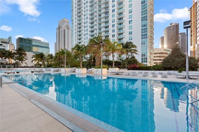 view of swimming pool with a patio