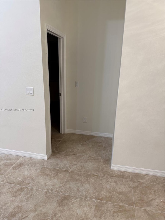 view of tiled spare room