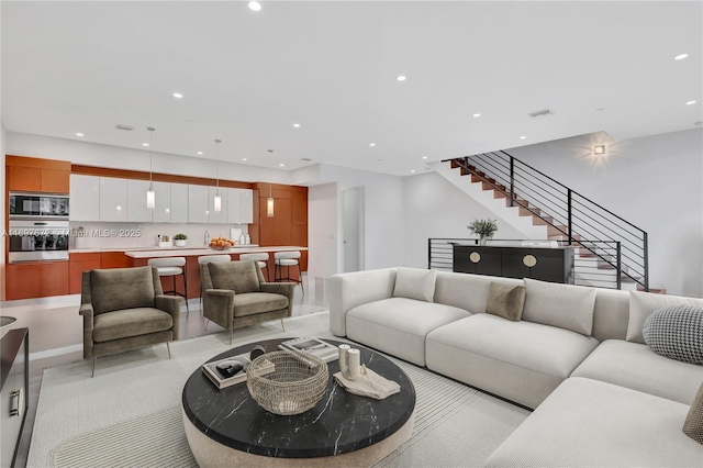 909 NE 16th Ter Unit 2, Fort Lauderdale, FL 33304 - living room featuring recessed lighting and stairway